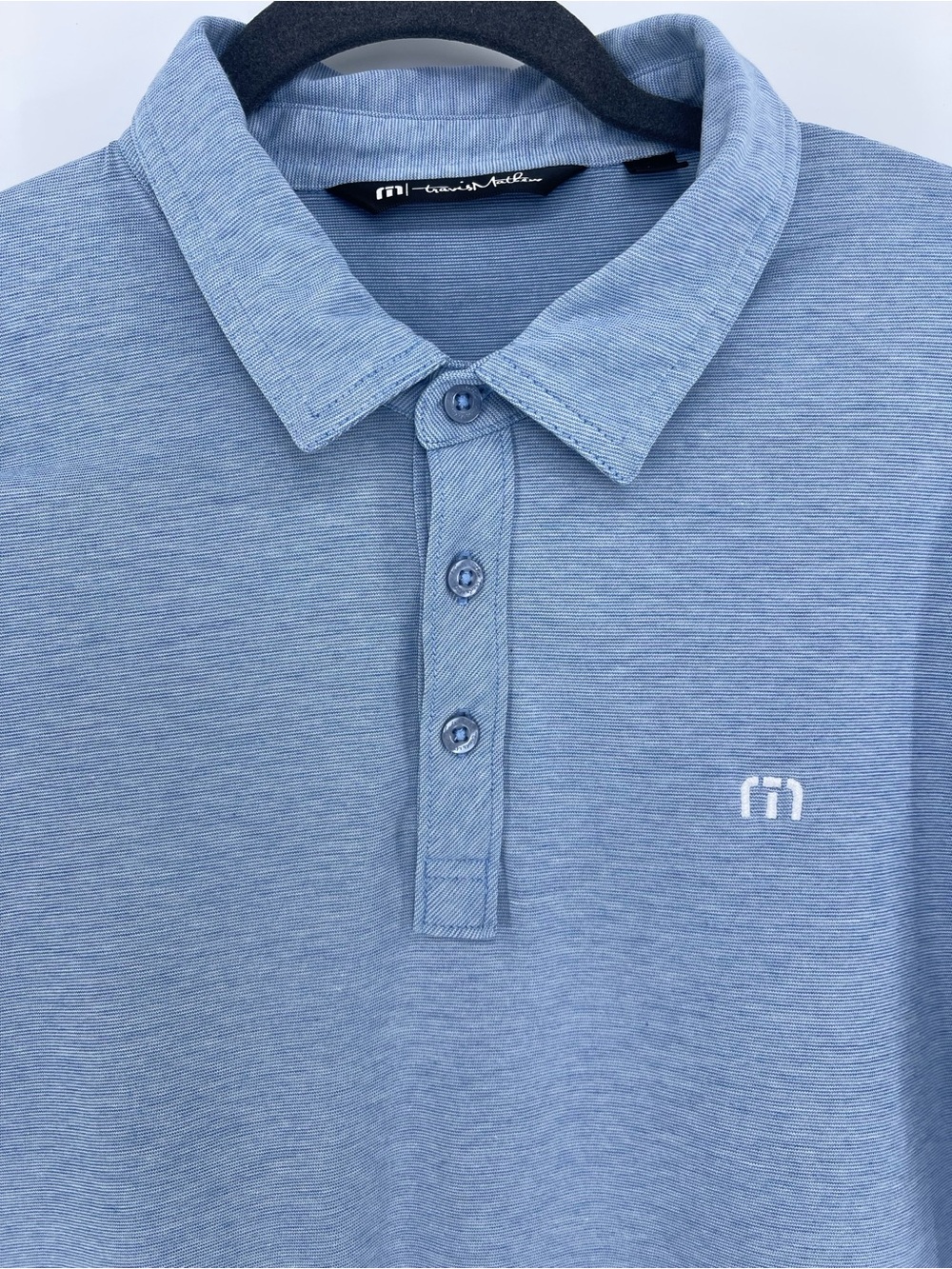 Travis Mathew Men’s Sky Blue Polo with Subtle Logo